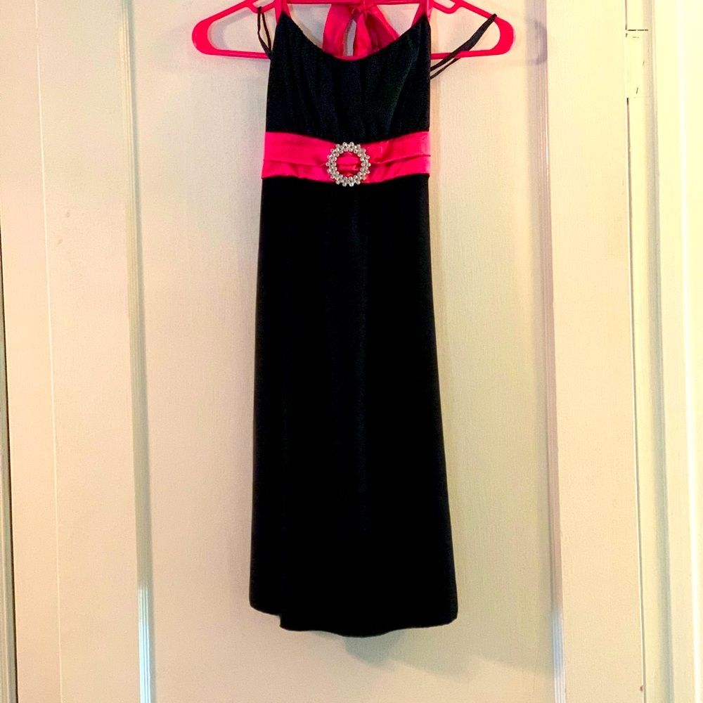 Black cocktail dress with hot pink belt and rhinestone decal